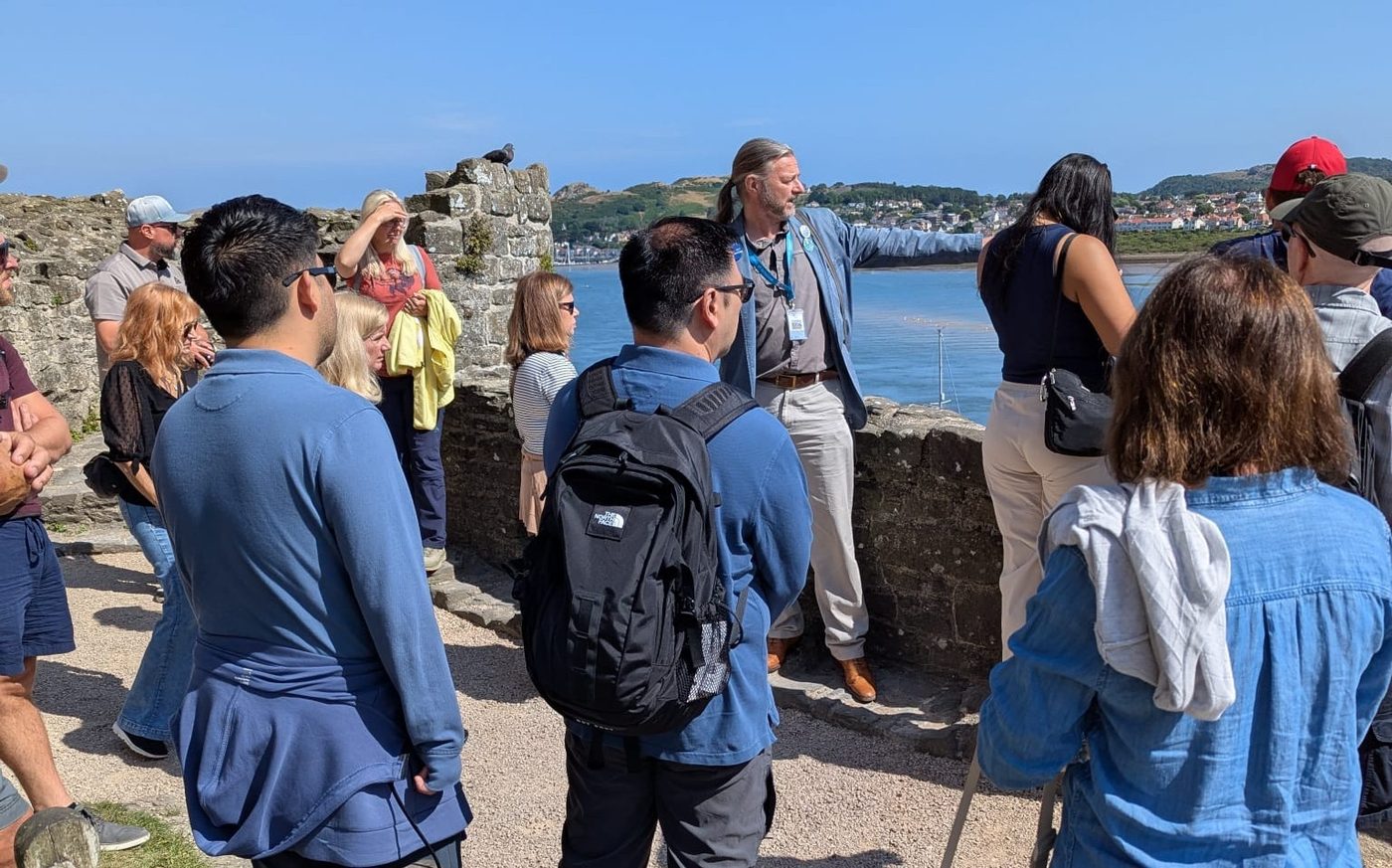 David Appleyard guiding a visitor group at Conwy Castle