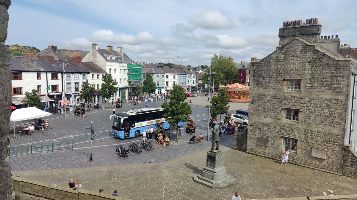 Historic Welsh town square with stone buildings